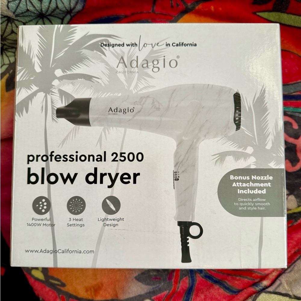 Adagio of California blow dryer. Brand new in box, never used. Retail $200